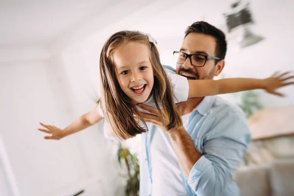 Happy family having fun time together at home