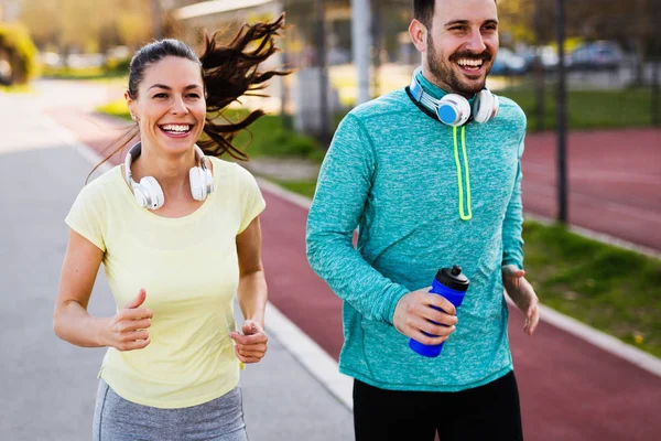 Young Attractive Cheerful Couple Running Sunny Day — Stock Photo, Image