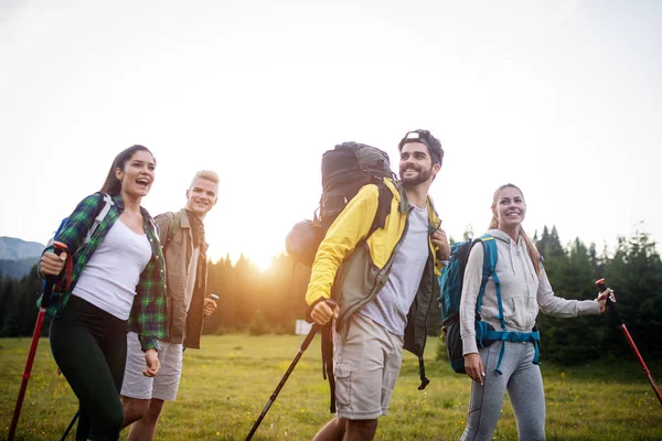 Group Hikers Backpacks Sticks Walking Mountain — Stock Photo, Image