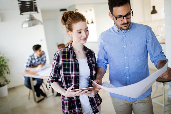 Coworking process, designer team working in modern office