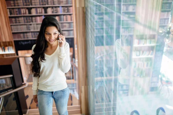 Beautiful Businesswoman Using Phone Indoors Smiling — Stock Photo, Image