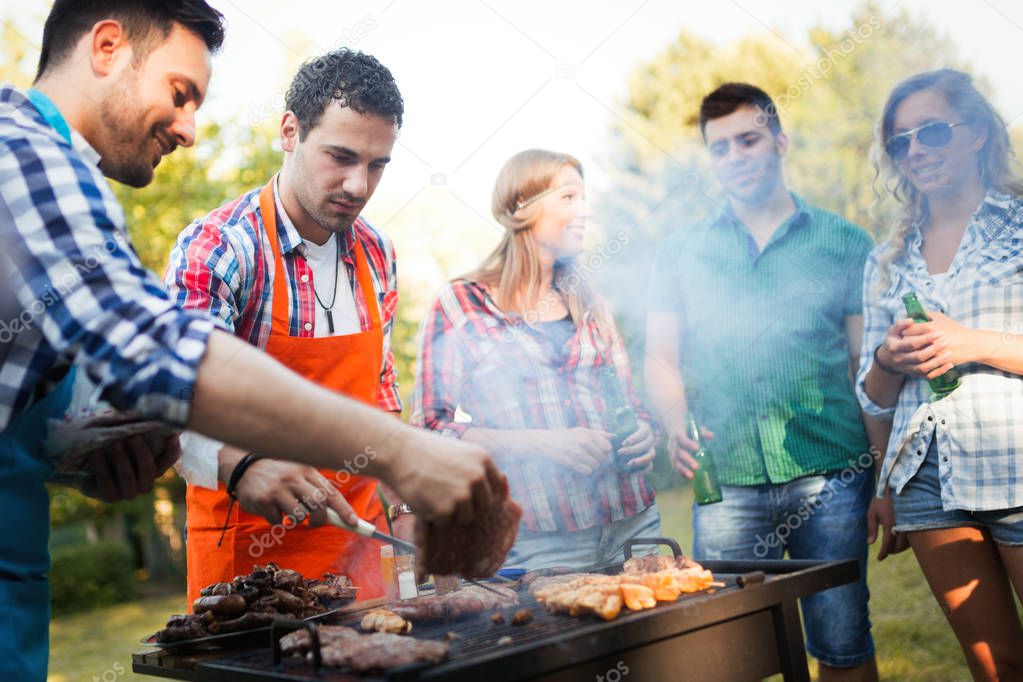 friends enjoying barbecue party