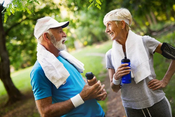 Senior couple is doing sport outdoors. Healthy lifestyle concept