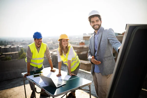 Team Architects Engineers People Group Construciton Site Check Documents — Stock Photo, Image