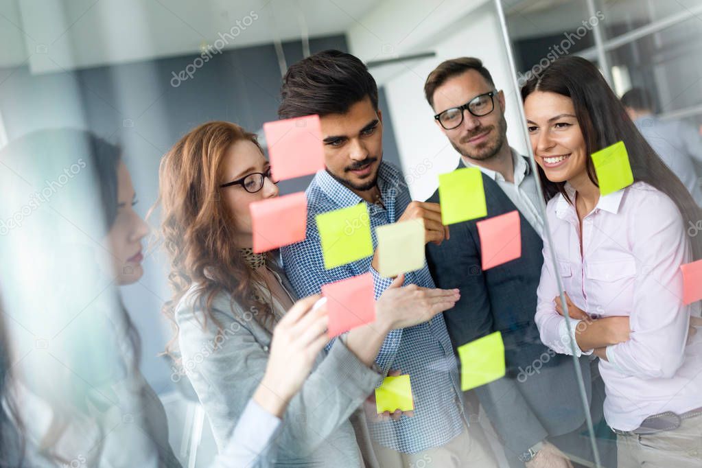 Group of architects and business people working together and brainstorming