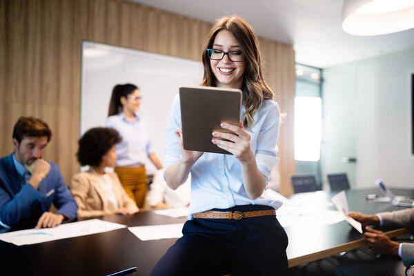 Successful happy business group of people at work in office