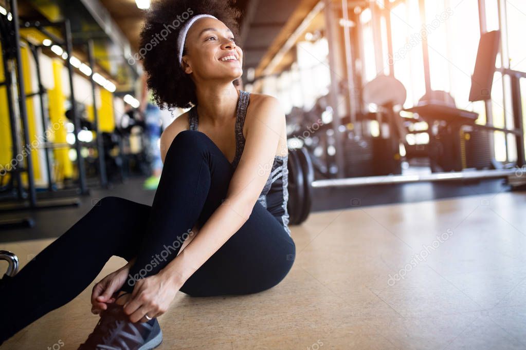 Close up image of attractive fit black woman in gym
