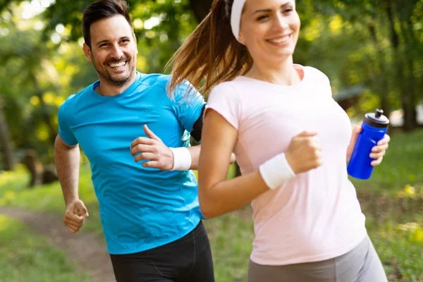 Couple Jogging Running Outdoors Nature Exercising Together — Stock Photo, Image