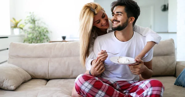 Cute Young Cheerful Couple Spending Time Home Eating Cake — Stock Photo, Image