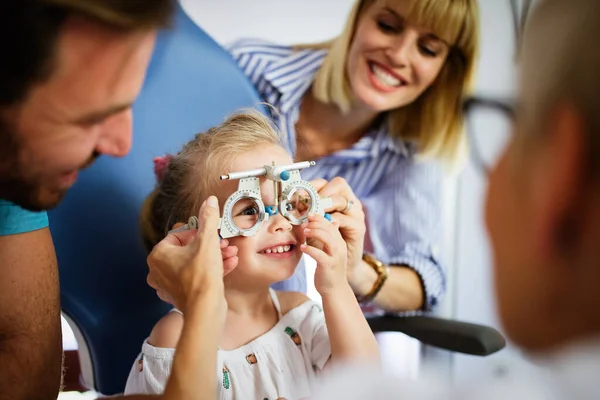 Ophthalmologist Optometrist Checking Child Little Girl Vision Looking Problems Caring — Stock Photo, Image