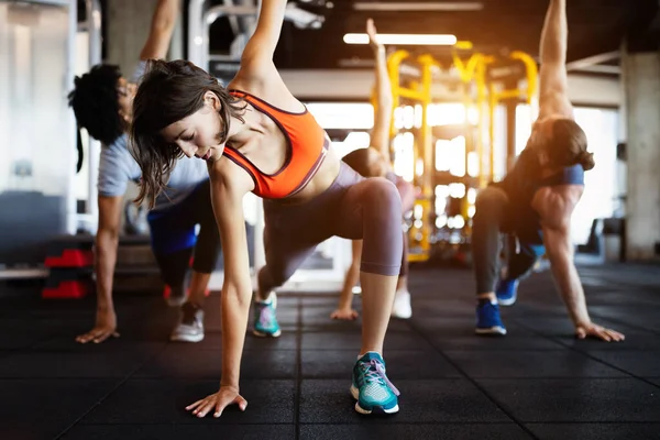 Group Young Fit People Doing Exercises Gym — Stock Photo, Image