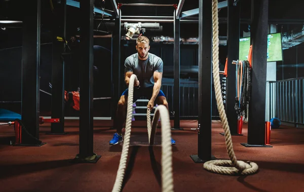 Young Fit Man Working Out Battle Ropes Gym — Stock Photo, Image