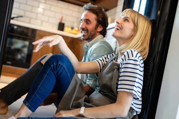 Young Tired Couple Sitting Kitchen Floor Cooking — Stock Photo, Image