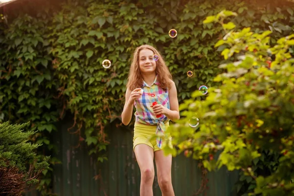 Child Girl Blowing Bubbles Summer Garden Sunset — Stock Photo, Image