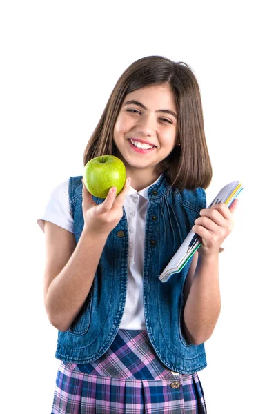 Schulmädchen Mit Notizbuch Und Apfel Auf Weißem Hintergrund — Stockfoto