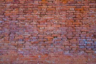 Kırmızı tuğla duvar deseninin arkaplanı.