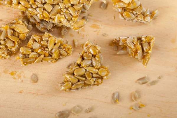 Broken Gozinaki Sunflower Seeds Wooden Board — Stock Photo, Image