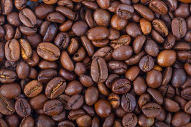 Kavrulmuş kahverengi kahve çekirdekleri model, arka plan, üstten görünüm.