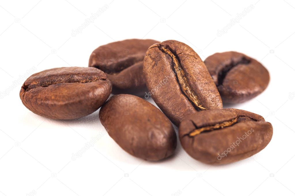 roasted coffee beans isolated on white background.