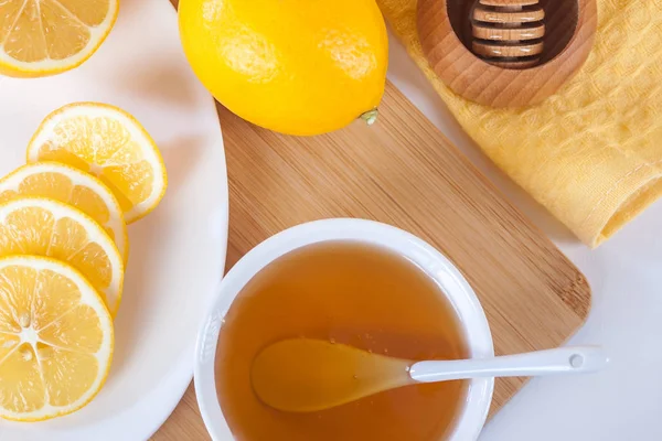 Honey White Ceramic Bowl Spoon Lemon Wooden Kitchen Board — Stock Photo, Image