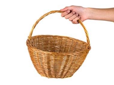 Meyve ve sebzeler üzerinde beyaz izole elinde boş sepet.