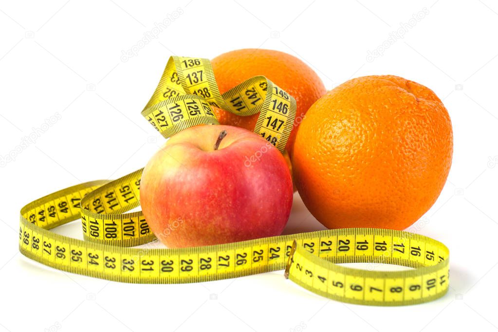 Apples and orange with measure tape on white background, healthy diet.