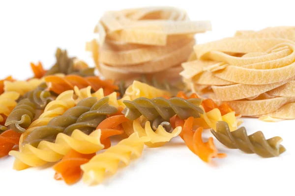 Colored italian pasta isolated on white background — Stock Photo, Image