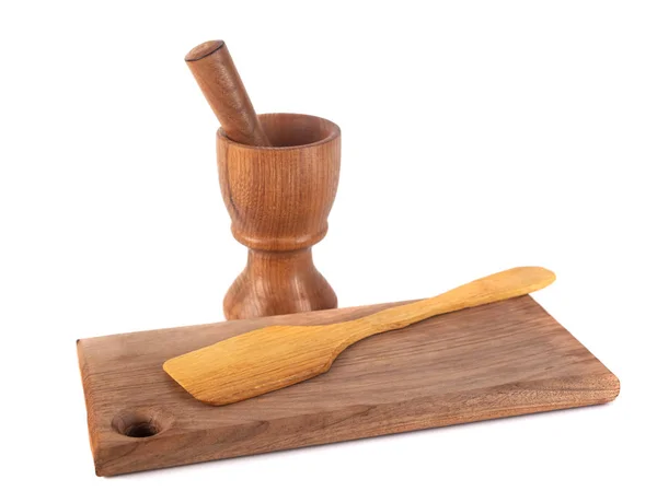 Wooden mortar (pounder), pestle board an spatula isolated on whi — Stock Photo, Image