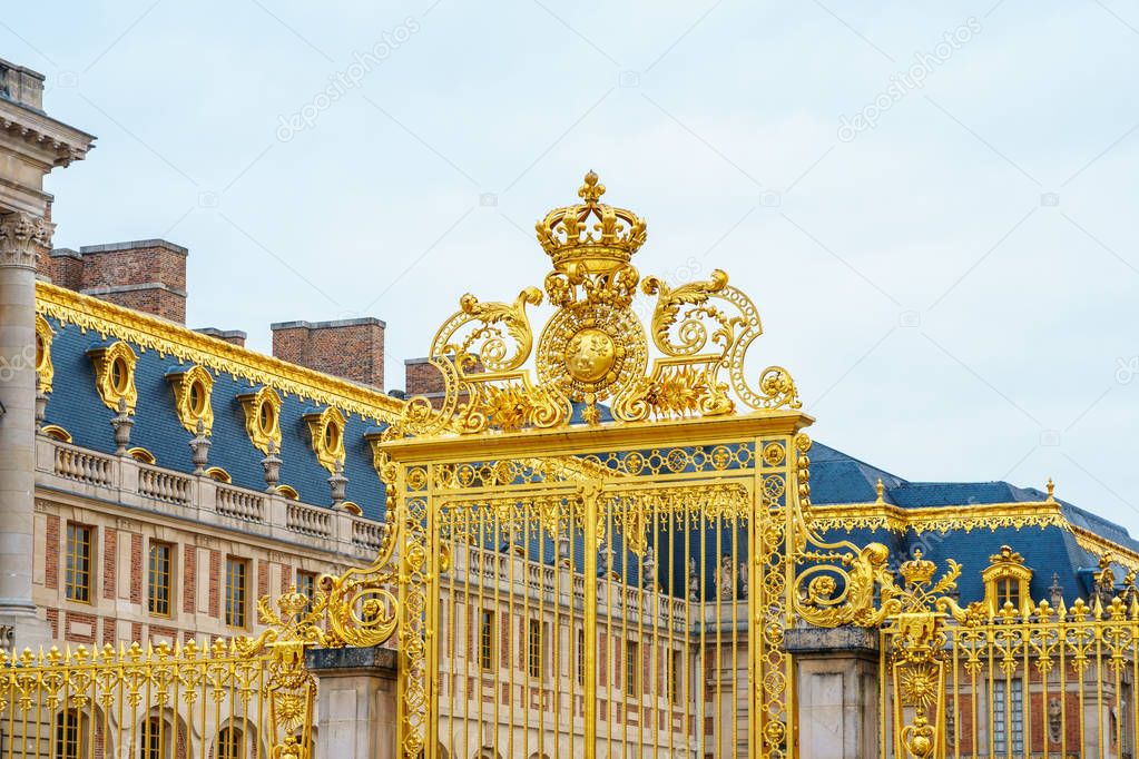 The golden gate of the Palace of Versailles in France
