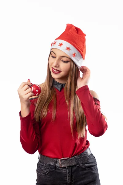 Bella ragazza in posa sullo sfondo bianco in rosso Capodanno ou — Foto Stock