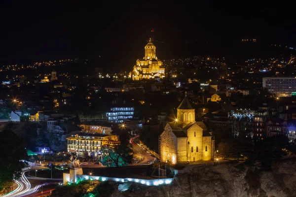 Night view of Tbilisi with Sameba (Trinity) Church and other lan