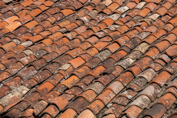 Old red tiles roof background, house roof. — Stock Photo, Image