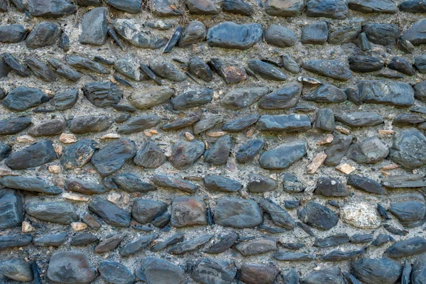 Textura de pared de roca vieja para el fondo, pared de piedra medieval . — Foto de Stock