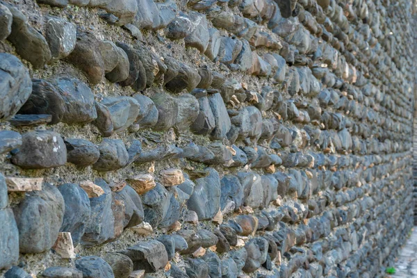 Textura de parede de rocha antiga para fundo, parede de pedra medieval . — Fotografia de Stock