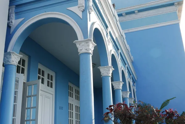 Partial view of a classic house facade in mint condition and located face the promenade and the Pacific Ocean in La Punta district of Callao, Peru.