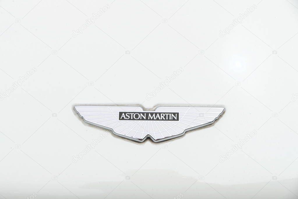 Lima, Peru. February 8, 2018. Car insignia of a mint condition white Aston Martin Vanquish coupe parked in San Isidro district of Lima.