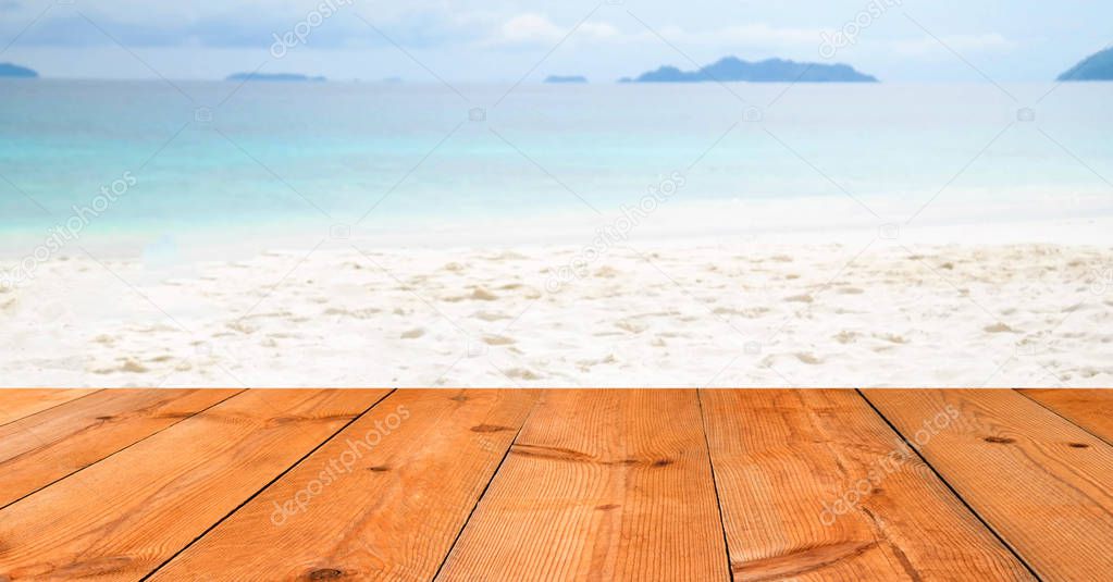 brown wooden board over blur bokeh background