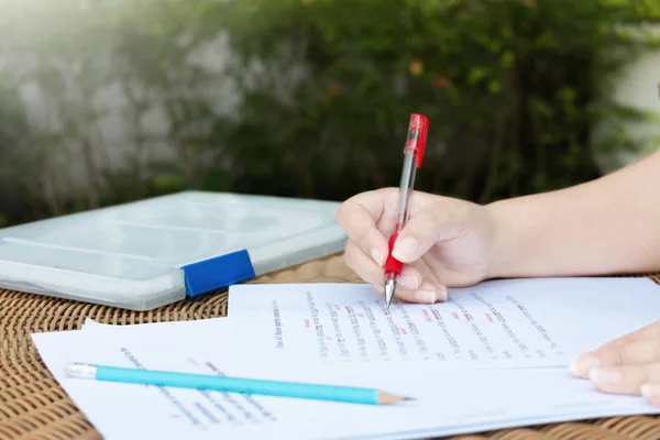 Proofreading paper on table for editing — Stock Photo, Image