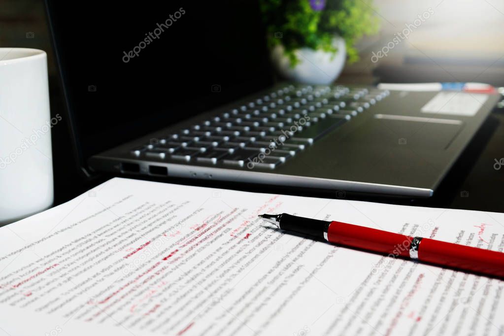 blur proofreading sheet on table
