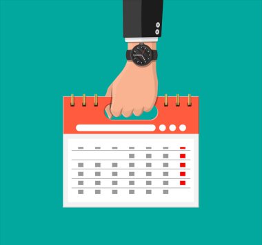 İş adamı izle ve sarmal takvim el ile