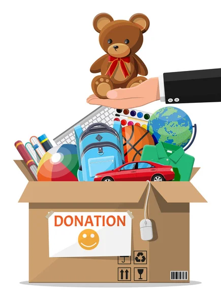 Donation box full of toys, books, clothes, devices — Stock Vector