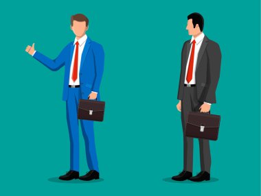 Çantalı, takım elbiseli iki adam. İş adamı karakterleri. Profesyonel ofis çalışanı veya yönetici konsepti.