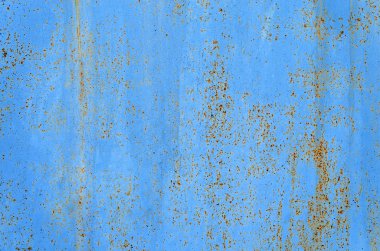 Paslı metal ile mavi arka plan Soyut doku. Eski vintage çizikler boya uyarıları demir yüzey. Arka plan. Yakın çekim.