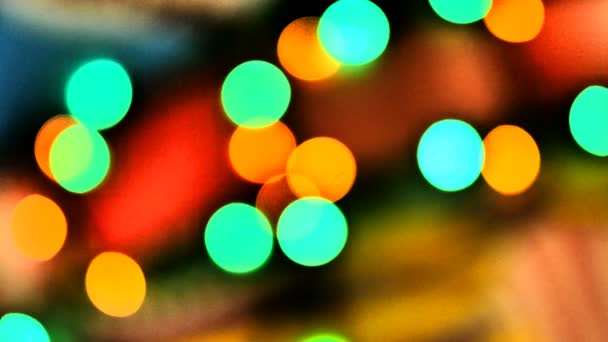 模糊的五颜六色的灯 闪闪发光的散景节日背景 抽象多彩光 圣诞节或派对概念 — 图库视频影像