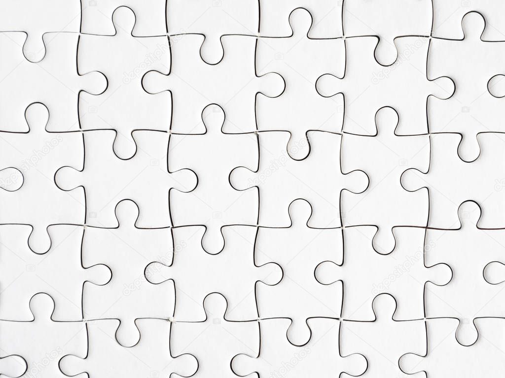 Group of white jigsaw puzzle in top view (Background / Texture)
