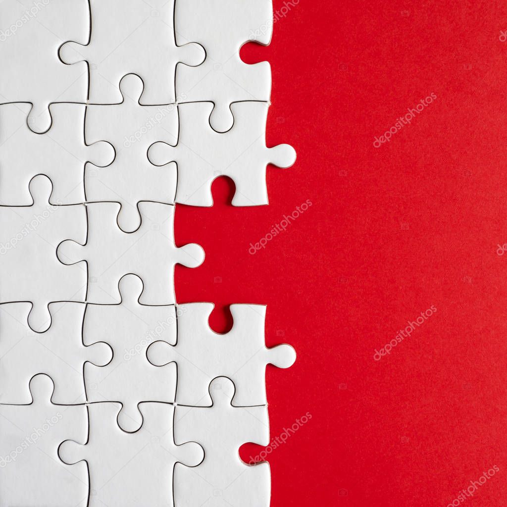 Closeup missing jigsaw group on red background (Business Concept)