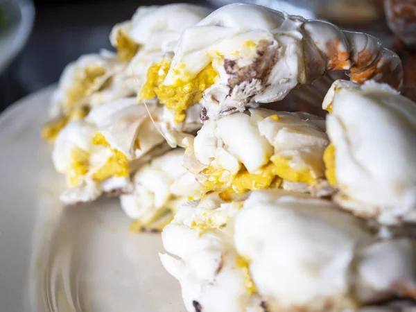 Close up of steamed crab on dish in the restaurant / delicious seafood in Thailand (Selective Focus)