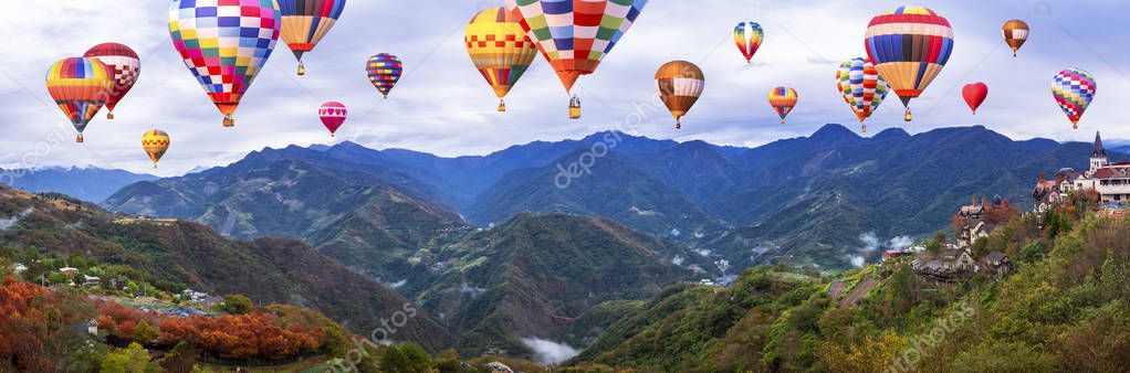 Colorful hot air balloon fly over mountain landscape of Taiwan 1