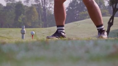 A golfer hits a golf ball with a golf club in Jakarta, Indonesia on September 13, 2025.