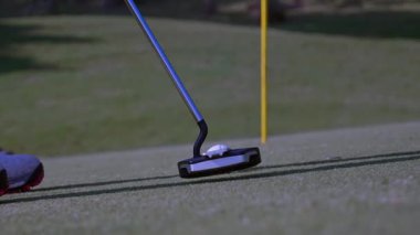 A golfer hits a golf ball with a golf club in Jakarta, Indonesia on September 13, 2025.